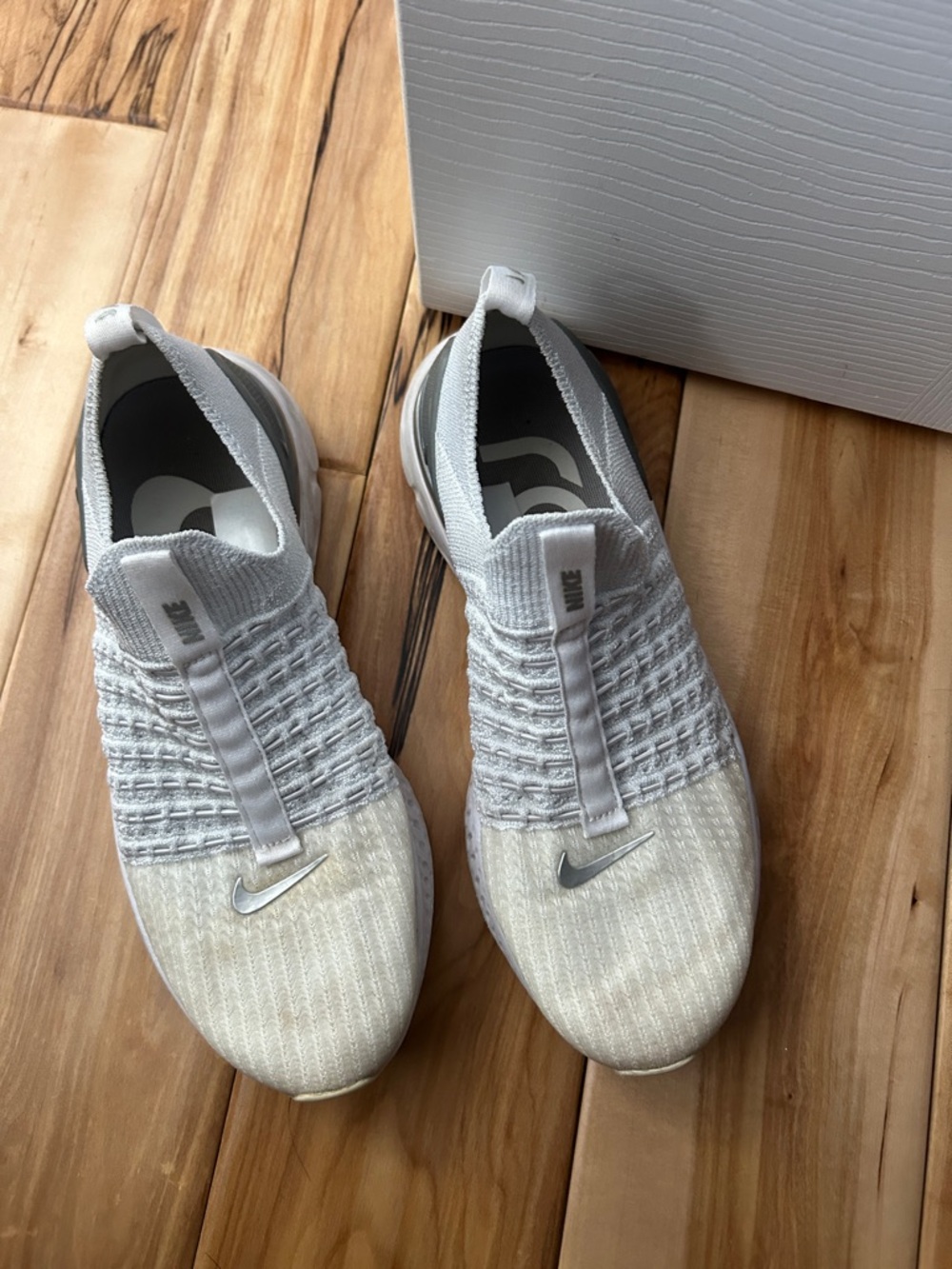 Nike women’s White Slip-On Knit Athletic Shoes